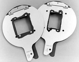 Filed out Beseler negative carriers. (Not actually mine, mine are in a box somewhere.. but you get the point.)