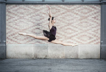 Urban ballerina dancing in the city